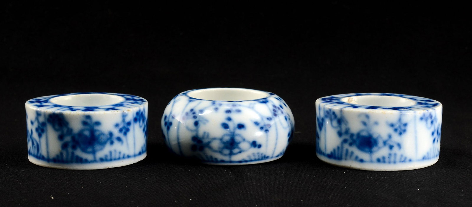 3 German Porcelain Fluted Style Open Salts: Three Tettau Blue Fluted style open salts. All marked 'T' underneath. Measure approximately 2" diameter x 1". Very good condition. Keywords: Salt Cellar, Salt Dip, Antique, Germany