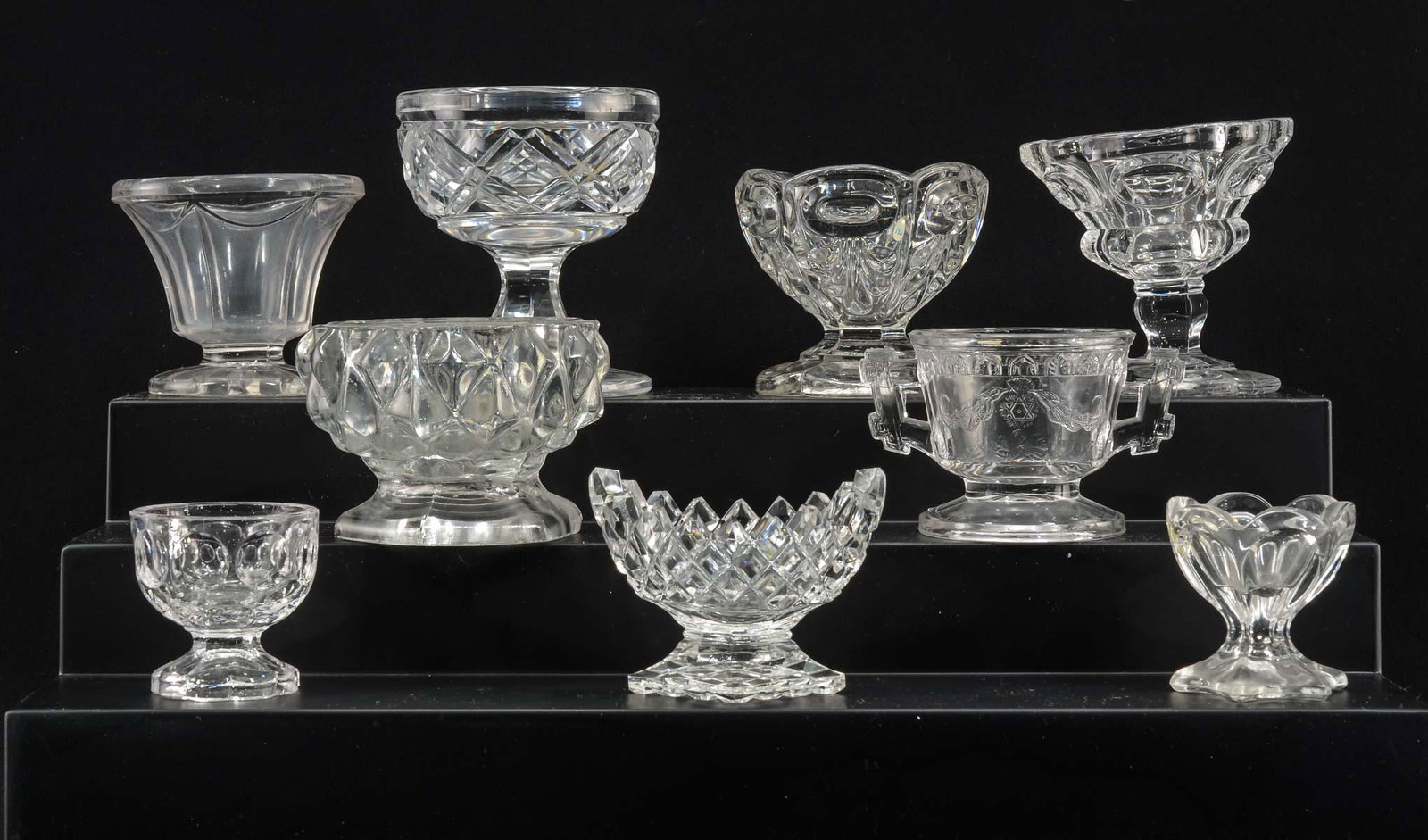 9 Pedestal Form Glass Salt Cellars: Includes: Unmarked Cut Crystal, Pressed diamond Pattern Boat-form, Flint Glass Type Sawtooth or Diamond Pattern with Hexagon Base, Thumbprint, Petal loop style, Star of David Pattern, Thumbprint Flint