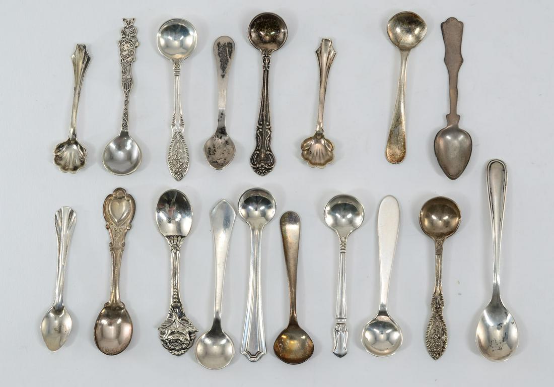 18 Sterling Silver Salt Spoons: Eighteen sterling silver salt spoons, in various patterns. 1.96 troy ozs. total. No hallmarks other than "STERLING" Keywords: Salt Cellar, Salt Dip, Miniature