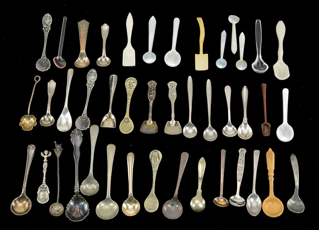 42 Mixed Salt Spoons: Forty two miscellaneous salt spoons, in silver plate and other metals, wood, abalone / mother of pearl, china, etc. Keywords: Salt Cellar, Salt Dip, Miniature