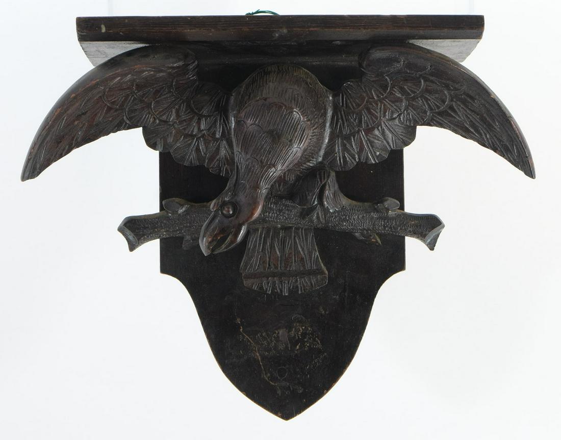 Folk Art Carved Eagle Bracket Shelf: Hand Carved Walnut Eagle on branch with outspread wings. Likely Walnut, old checked surface and good patina. Several repairs, surface marks, etc. Most llikely American, 19th Century. 13" x 18" x 6.5".