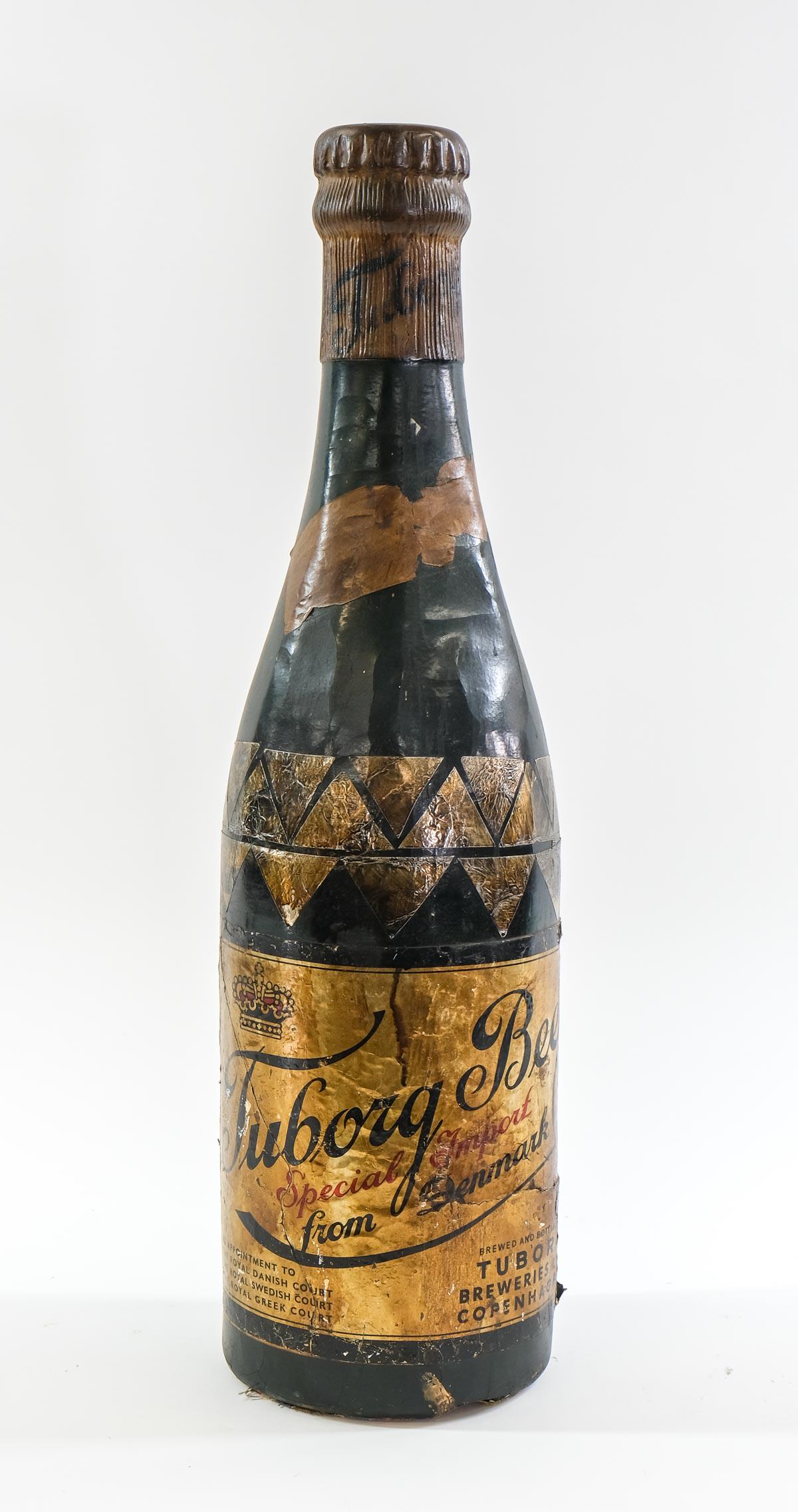 Oversize Tuborg Beer Advertising Bottle: Tuborg Breweries Copenhagen Denmark, immediate post-prohibition era large liquor store of Bar Advertising Beer Bottle Sign. lithographed labels and composition. Bottom repaired. 31" tall. Keywords: An