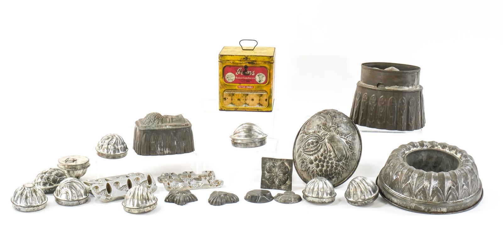 Antique Tin Food Molds: Cake Pans, Cookie Molds, Chocolate, Bread, Ice cream etc. Largest: 9" Keywords: Kitchen, Pantry, Vintage, Cooking,