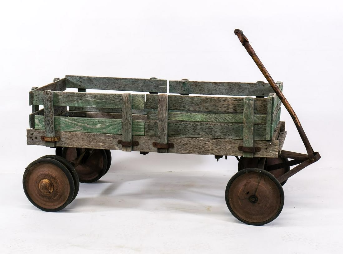 Vintage wood and steel Pull Wagon: Great farm or country style wagon. Steel frame and wheels, stake-sides, old paint. Would make an excellent garden piece. weathered, as-found. 54" x 22" x 17"