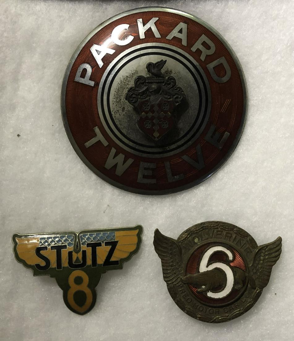 Three car badges - Packard, Stutz, Reo Wolverine: Three car badges - 1920’s - 1930’s - Packard liuggage rack, Stutz, Reo Wolverine
