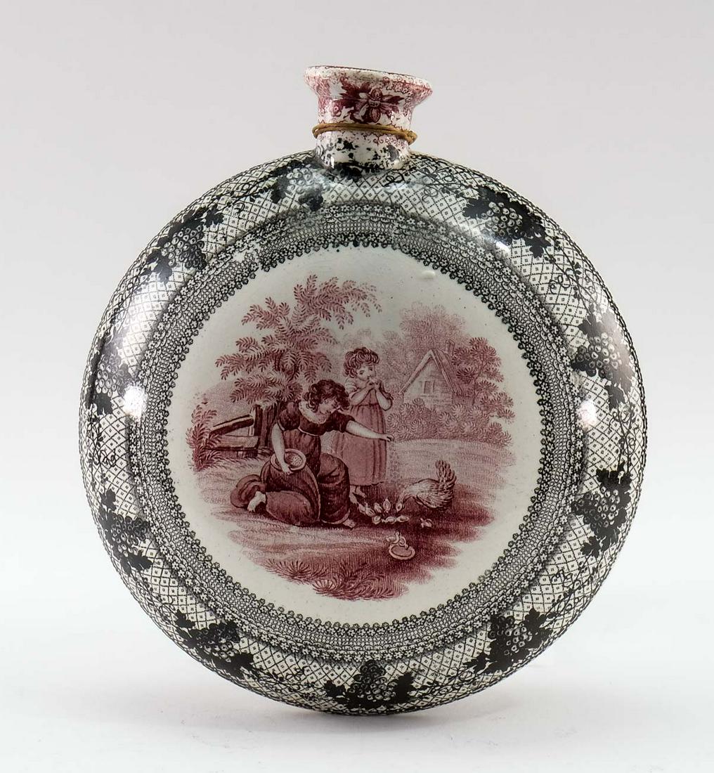 Staffordshire transferware Flask: Antique English Staffordshire canteen or bottle flask, no cork. Transfer decorated on both sides One of the scenes is a man on a horse drinking water. The other side has a scene with a women and child