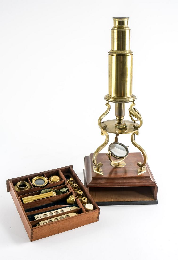 Culpeper Style English Brass Microscope: Culpeper Style English made brass microscope mounted on a wooden base. Late 19th / Early 20th Century. This microscope is in working condition with many extra parts and accessories. The brass has a fe