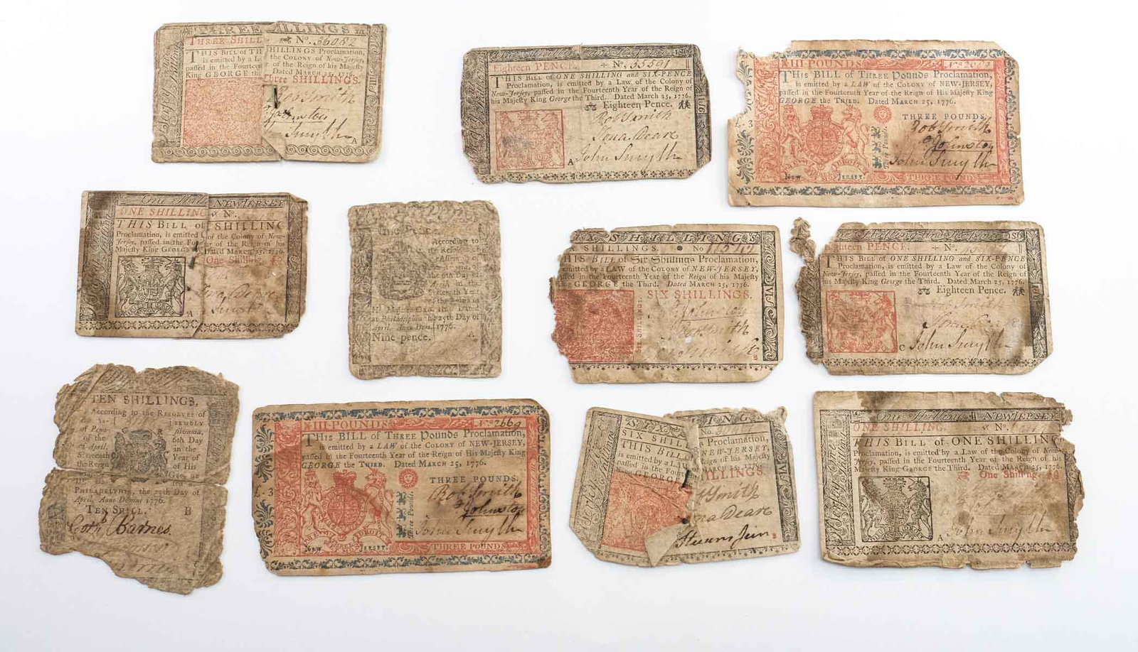 Estate Found Colonial Currency: Mixed Colonial currency, As-is, where is. Pieces torn and repaired, pinned, clipped, soiled etc. 11 pcs.