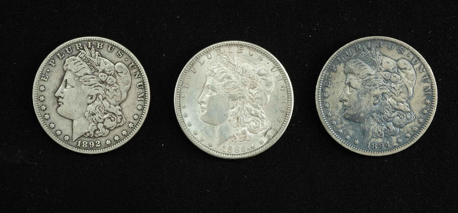 Three "Better Date" $1 Morgan Silver Dollars (1 of 5)
