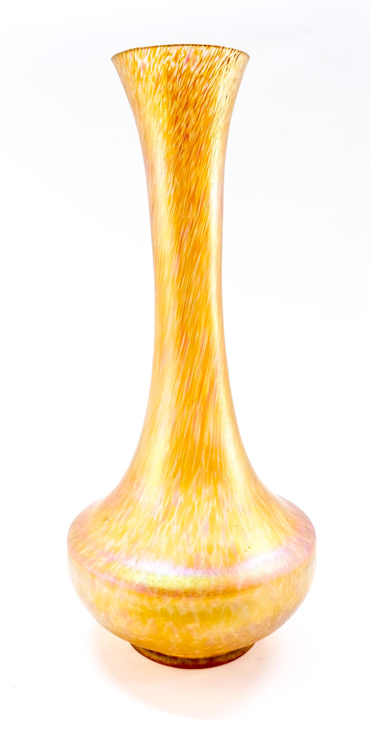 Tall Gold Iridescent Art Glass Vase: Unsigned, rainbow gold and pink aurene style finish over clear glass blank 17.75" Tall. very good condition, minor shelf wear. Keywords: Art Nouveau, Manner of Nash, Quezal, Durand, Loetz