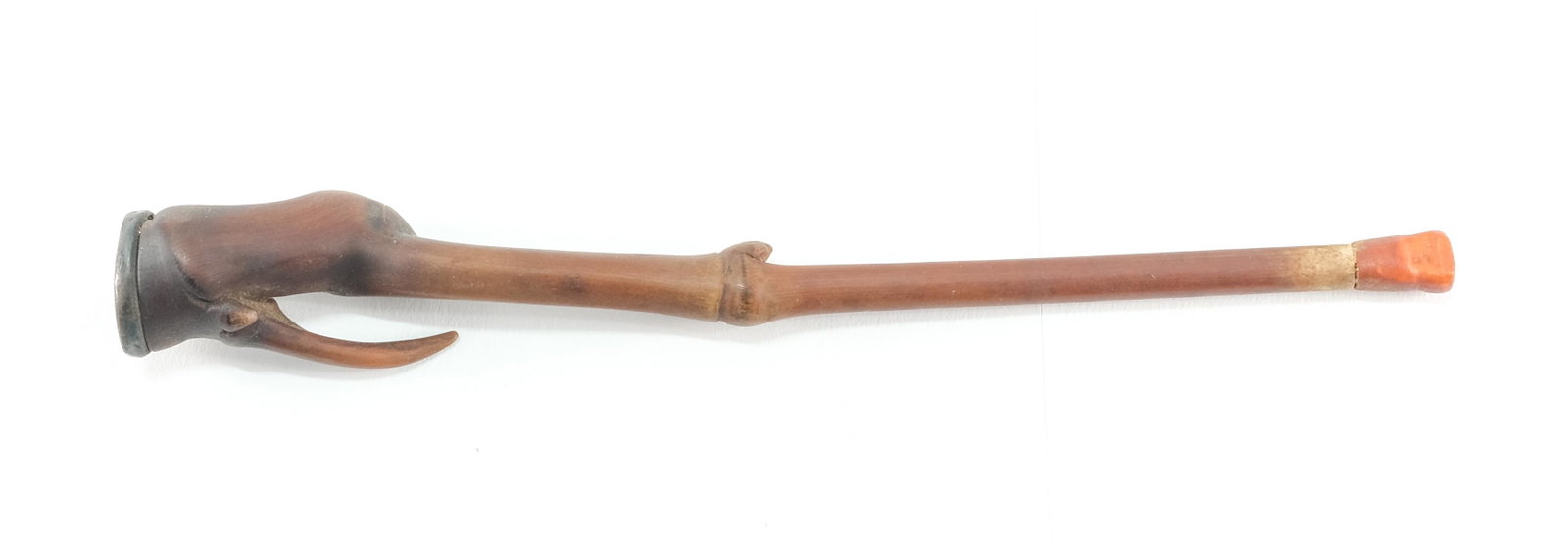 Antique Animal Leg Bone Cheroot holder: Unusual Dog or Bird Leg Bone Cheroot or Cigarette Holder with Silver mount and Amber tip. 19th/20th century, 7" long, Smoked, but solid. Keywords: China, Chinese, Sterling, Smoking, Cigar, Tobacco,