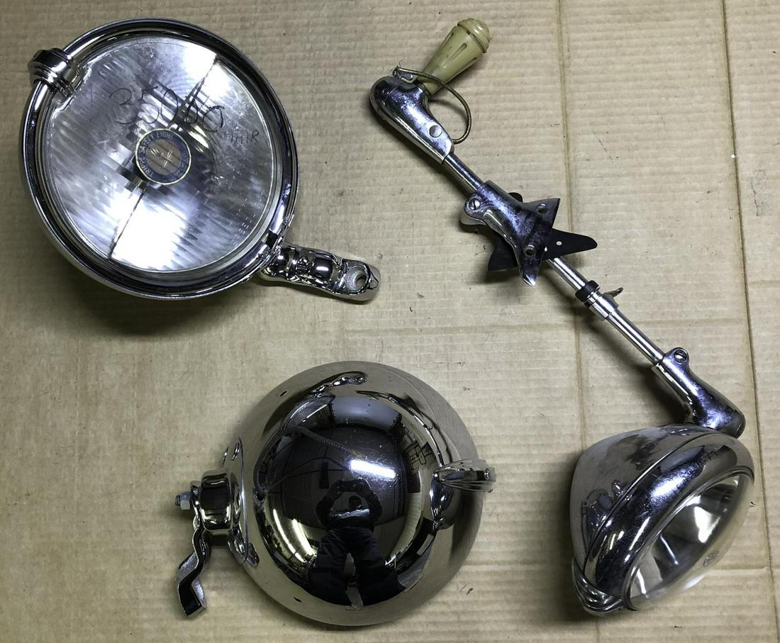 Pair of Trippe lights and Unity spotlight: Pair of Trippe driving lights, appear to be NOS, perfect chrome, and Unity accessory spotlight