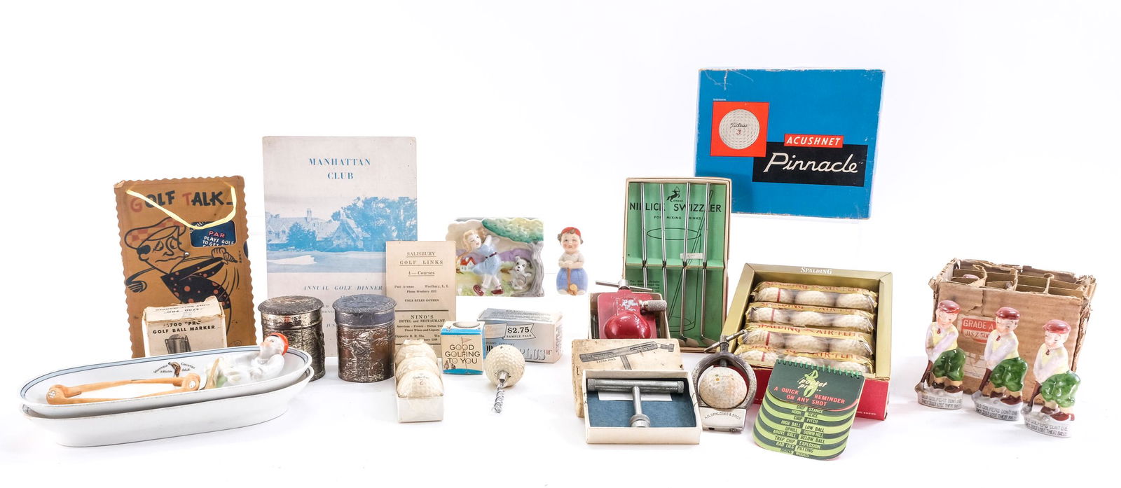 Golf Collectibles: Various golf collectibles. Mid-20th century. 1 new box of Spalding Air-Flite golf balls in 4 sealed packs (12 balls). 1 golf ball corkscrew. 1 Phillips Golf Spike Wrench. 1 United Metal Products Golf