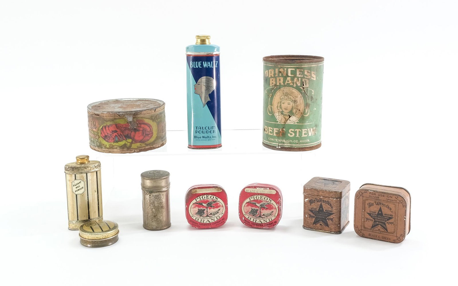 10 Advertising Tins: Princess Brand Beef Stew, Rutland, VT 4" X 2 1/2" can is rusted graphics are clear but soiled and torn is some places. Beaver Brand Lobster, Montreal Canada 1 1/2" X 3 1/2" can is rusted graphics are 