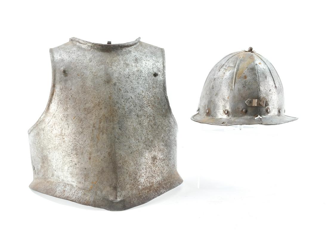 English Civil War Helmet and Breastplate: English Civil War/ Cromwellian period breastplate and helmet. Mid-17th century. Both seem to be steel. Helmet is a lobster-tail style helmet, no neck protector. Brim is complete, and nose guard holder