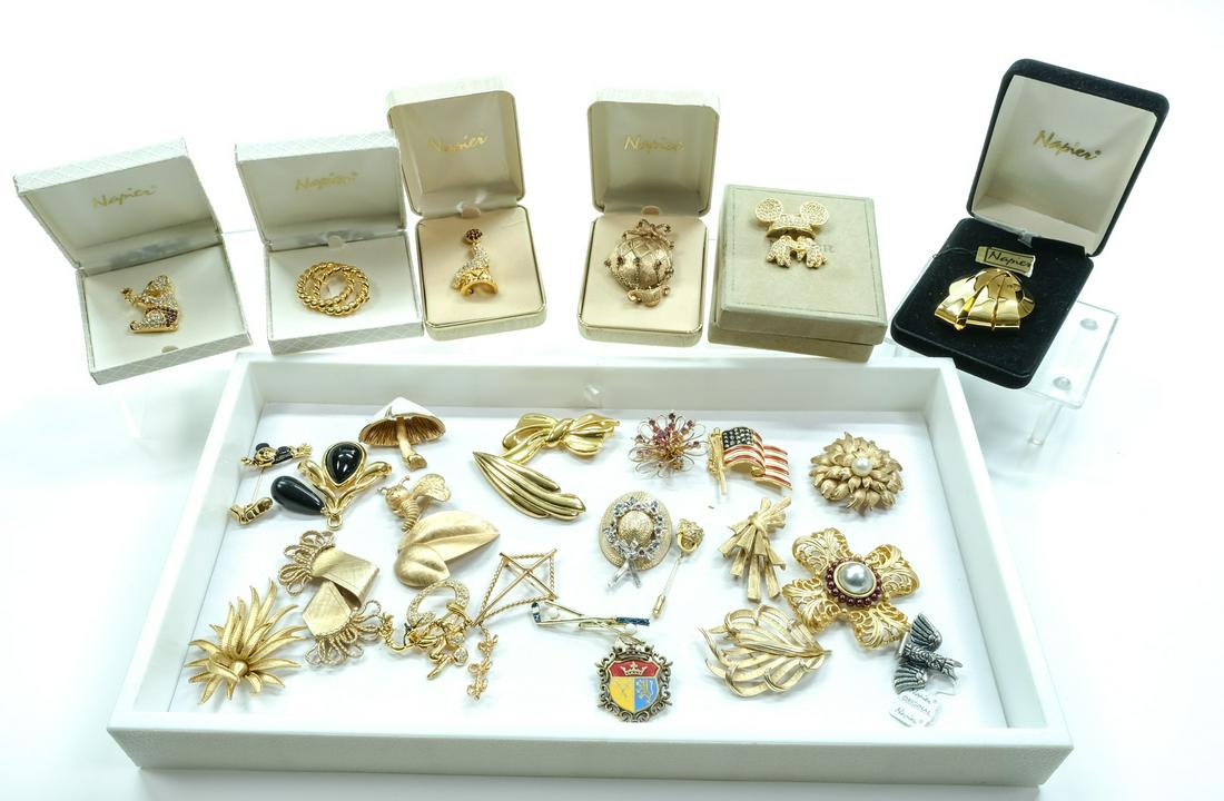 Napier Fashion Jewelry Pins - Disney: Lot of 28 fashion jewelry pins or brooches, mainly by Napier, including a few Napier Disney pieces. 6 boxed pins by Napier, including Mickey Mouse Ears and Gloves, an elephant, a sea lion, a hot air b