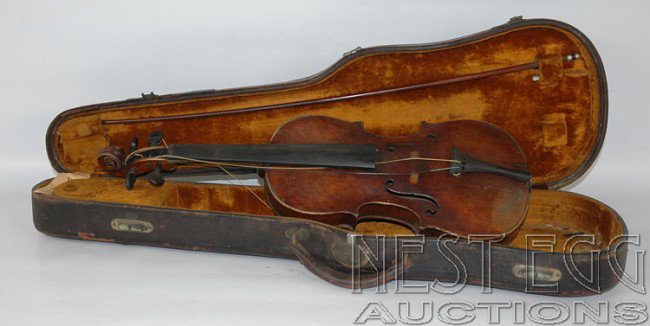 Antique Italian Style 4/4 Violin: Unsigned, no label, with unsigned bow, as-is. This is essentially a prop violin used by Alfred Cheney Johnston in Many of his photo shoots. The top of the instrument exhibits extensive cracks and line