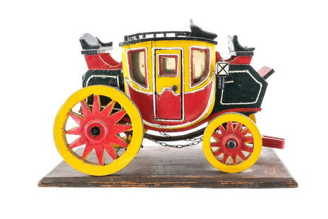 Carved and Painted Wood Folk Art Stagecoach: Carved and painted wooden folk art stage coach. American, ca. early to mid 20th century. Hand painted. Doors work and wheels can spin. Condition is good overall, with minor wear and some separation.