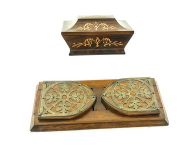 2 pieces - Inlaid Wood Box and Wood Book Rack: Two pieces. One inlaid wood box with floral decorations. Late 19th century, most likely English. Velvet lined interior. Very good condition. About 5" tall by 6 1/8" long by 8 9/16" wide. One wood and