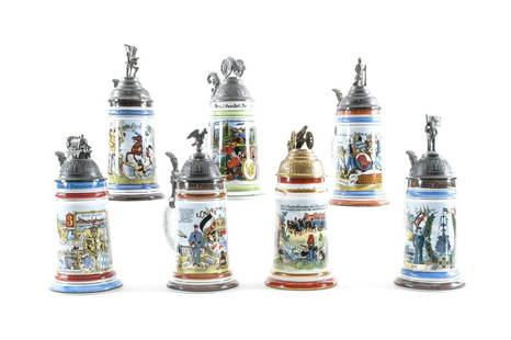 7 Reproduction German Regimental Beer Steins: Lot of 7 reproduction German regimental beer steins. German, ca. mid to late 20th century. All 7 have lithophanes, 5 of which are nude women. 2 are the sailor and his sweetheart. Figural pewter lids