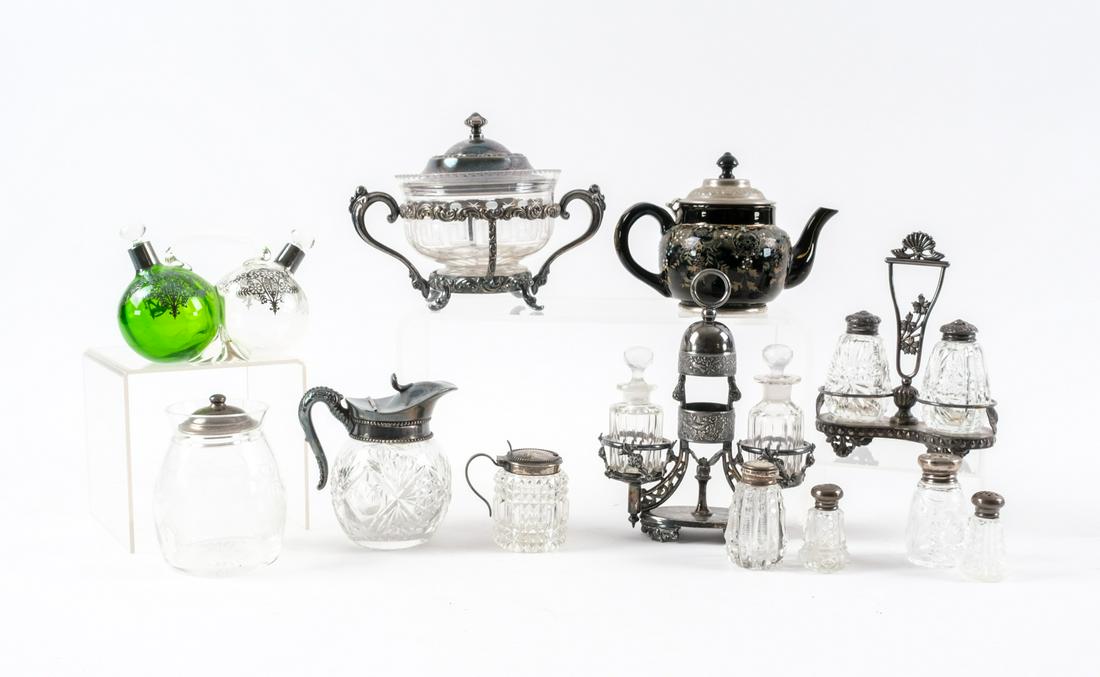 Collection of Early Table Accessories: Twelve pieces of mostly made in Meriden, CT condiment service items. A covered silver plate and glass dish marked Meriden B Co, 7 1/2" X 6 1/8" overall, the glass is 5" X 3". A Manning & Bowman person