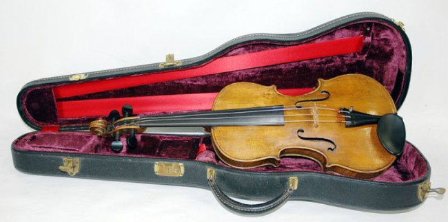 4/4 German Stradivarius copy Violin: Good quality strad copy, Marked Imperial Violin Stradivarius on headstock reverse, six sided star mark on nose, finish is clean, top is solid and free from cracks or damage, back is nicely bookmatched