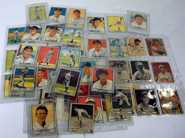 Group of 1940 Play Ball Gum Inc baseball cards: This group of 41 Cards plus cut outs, is original and contains very good players: Ted Williams, Joe Dimaggio (big league rookie), Lefty Gomez, etc. These cards were all pasted down into an album at on