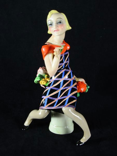 Lenci Art Deco Italian Figurine: Blonde woman with basket of flowers lenci figure, marked Lenci Torino, Made in Italy 5-XII, -m-. This figurine is well crafted in the known lenci style. It is in nice shape, however does have damage i