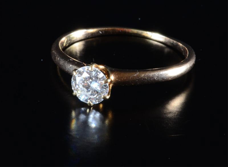 14K gold and diamond solitaire ring: Approx .47 carat, SI2, F color stone, cut round brilliant. Ring is approx. a size 6.5. Ring has been sized previously and also has some engraving on the inside. Copy of Insurance appraisal from Mallov
