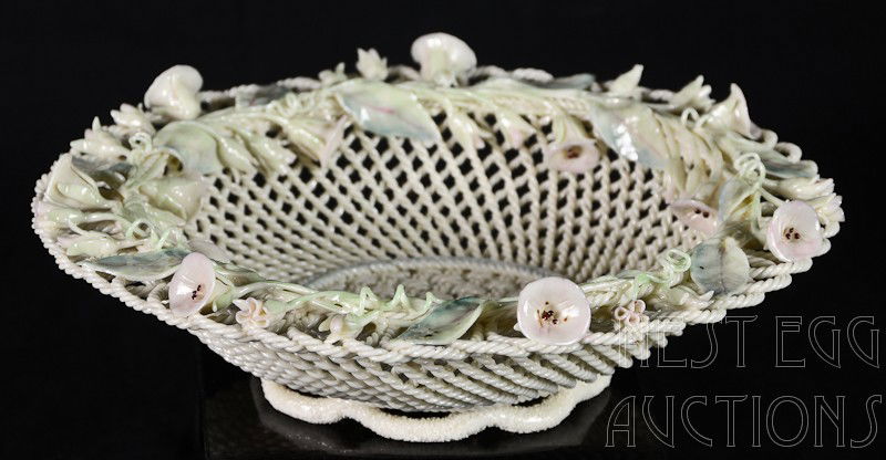 Fine and Rare Irish Belleek Fermanagh Basket: a delicate and beautiful painted porcelain basket marked on the bottom. 9" Diameter, only very minor tiny losses to a petal or two.