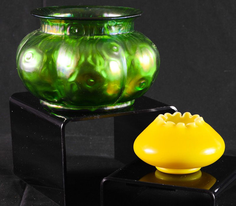 two pieces of early 20th Century Art Glass: Green iridescent squat vase / bowl possibly Loetz, excellent condition: 4.5" Tall, 7" Wide and a small cased yellow rose bowl / bud vase in the style of Tiffany. 2.25" tall, 3.5" W