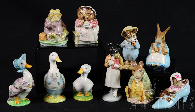 10 Beatrix Potter Beswick porcelain figurines: Excellent condition, includes the following: Mrs. rabbit and Bunnies, Samuel Whiskers, Mr. Jeremy Fisher, Jemima Puddleduck, Tom Kitten and Butterfly, Mrs. Tiggy Winkle takes tea, The old woman who li