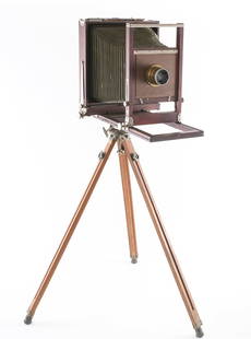 Antique View Camera: Restored 8" x 10" antique view camera. No manufacturer's plate present on reconstructed bellow guide. Features a Goerz Dagor Series III, No. 5 lens (f 6.8, focus 10 3/4 in.) Nr. 310913. Shutter