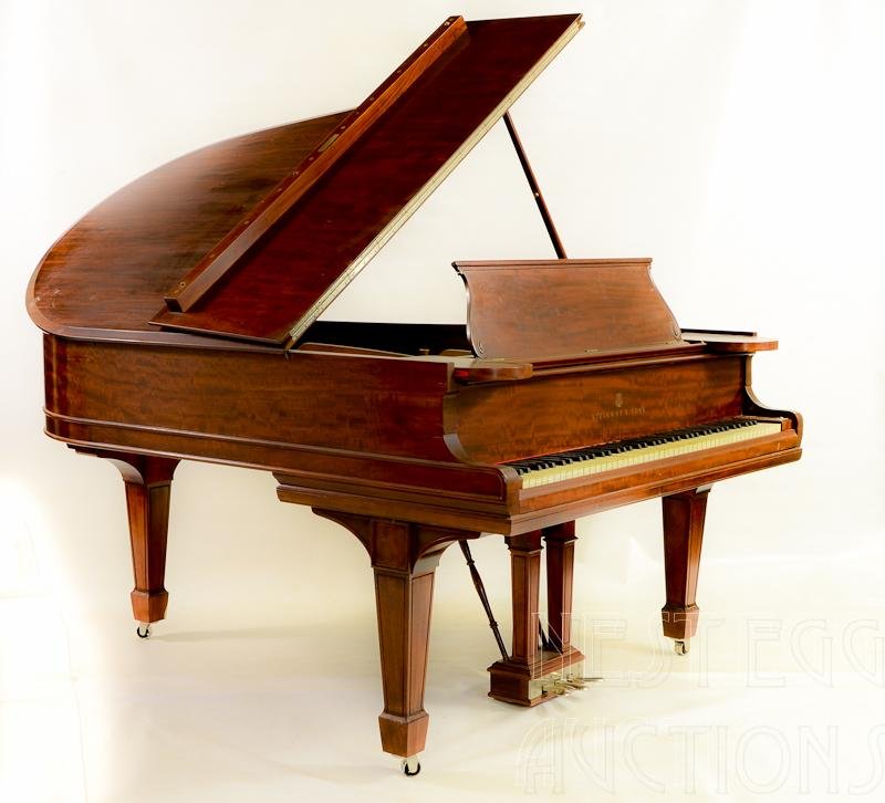 Steinway Model O Mahogany Grand Piano: Serial # 99302, Manufactured 1901, possibly an old refinish, slight yellowing to ivory keytops some minor cracks from age. Original Soundboard with several shimmed cracks, Bridges in good condition, T