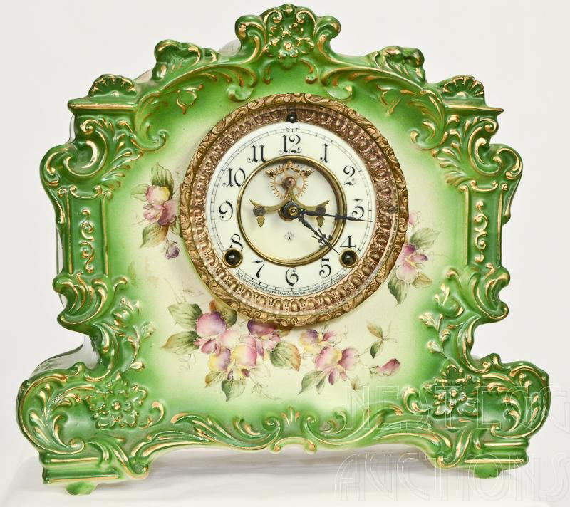 Royal Bonn Porcelain Case Ansonia Clock: Royal Bonn Porcelain Case Ansonia Clock. Beautiful case, face is nearly flawless, displays beautifully. Includes pendulum. Running. Minor crazing throughout. 