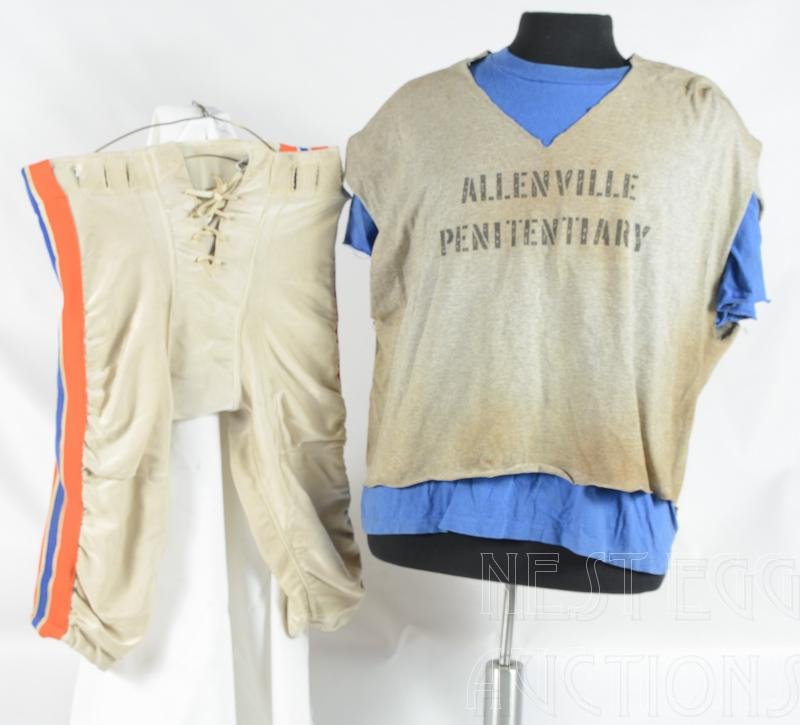 The Longest Yard Screen Used Costume: Costume used in the 2005 reboot of the Longest Yard (Nelly). This prison football uniform was worn by Nelly's stunt double Mazio Royster, who is a former running back for the Tampa Bay Bucca