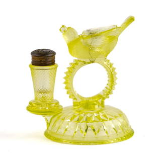 Vaseline Glass Combination Open Salt: A molded yellow Vaseline bird with berry castor set. Pepper shaker with napkin ring and open salt. Attributed to Aetna Glass Company, Bellaire, Ohio, circa1887. There is chip on the underside of the p