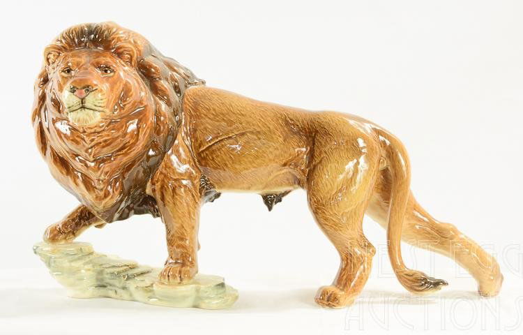 Large Goebel porcelain Lion Figure: Large Goebel Lion figure. "Walking Lion." Marked "Goebel W. Germany." and 36 019 25. Excellent condition with no visible chips, cracks, lines, or repairs. Measures approximately 7.5" x 10.5" x 18.5"
