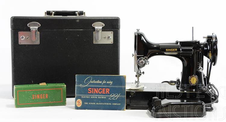 Centennial Singer 221 Featherweight Sewing Machine: Outstanding example of Singer's centennial model 221 featherweight machine. Complete and in working order in original case. Serial # AJ918773