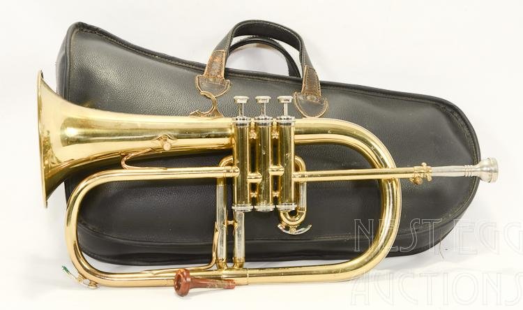 Couesnon Paris Monopole Flugelhorn Made In France: Vintage Couesnon Monopole French made Flugelhorn. Marked B flat 33. Valves and slides move freely. Includes two mouth pieces, one metal the other appears to be bakelite. Soft sided gig bag also includ