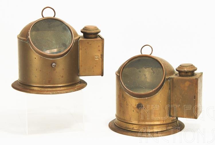 Brass Binnacle Group Of Two: Group of two brass nautical navigation binnacles. Nearly identical in size and shape, but made by different makers. One was made in Great Britain, and the other is a Bergen, made in Norway