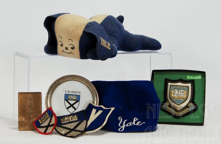 Vintage Yale University Souvenir Lot: Group of vintage Yale University souvenirs. Lot includes: Plush felt Yale puppy dog souvenir doll Felt embroidered Yale head band or wrap or cap Calhoun College seal ashtray Two Calhoun College 