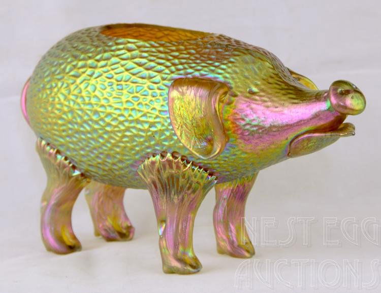 Iridescent Art Glass Pig Attr. Loetz:  Likely Loetz. Good overall. Chip in left front foot. Minor flea bites along the rim of the opening on the creature's back. Pig looks to be plant or vegetable in nature, having