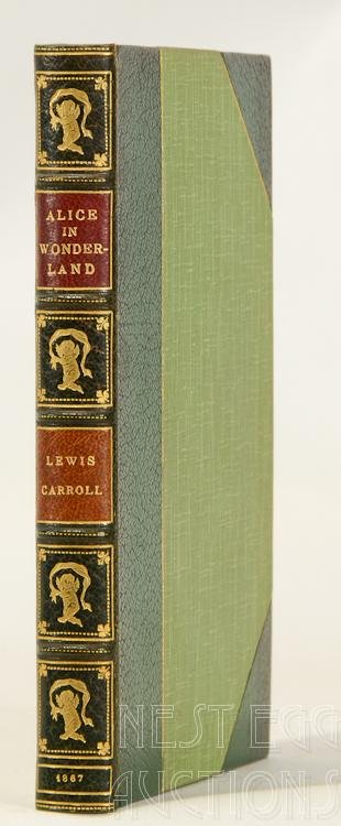 Alice In Wonderland Lewis Carroll 1867: Lewis Carroll's Alice in Wonderland, bound in green leather with green linen wrapping. Published in 1867 in London by Macmillan and Company. 42 illustrations by John Tenniel. "N