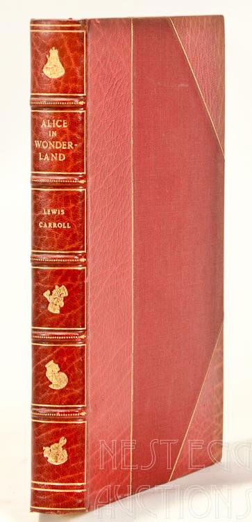 Alice In Wonderland by Lewis Carroll: Alice' s Adventures in Wonderland by Lewis Carroll Illustrated by Arthur Rackham, with a Proem by Austin Dobson. Year Unknown. Bound in red leather with leather and linen end boards. Gilt
