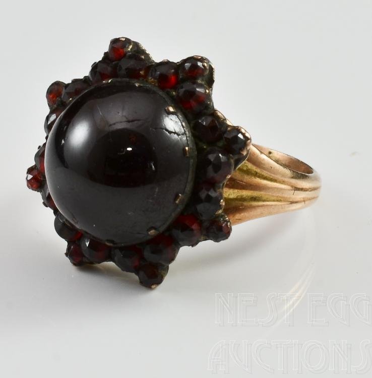 14K Gold Victorian Garnet Ring: Natural Center stone with exposed lines/inclusions, size 5, 3.5 dwt total, overall excellent condition.