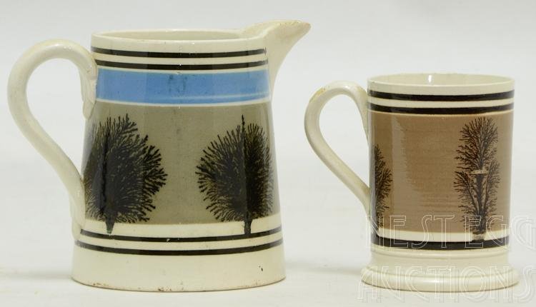 two pieces of Seaweed Mocha Pottery / Mochaware: The Smaller cup / Mug Measures 3.75" Tall, and 4.5" Wide (at the handle) Bright clear colors, excellent condition save for one fine tight line showing on the interior only the extends 2" down from the