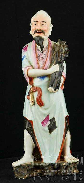 19th Century Chinese Porcelain Hand Painted Statue: Hand painted Chinese statue. Male figure, with bundle in arms, possibly twigs or firewood. Good overall, with minor oxidation and paint loss. Small chip or two on base, and his bundle is missing three