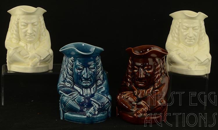 Four Elihu Yale Wedgwood Toby Mugs: Group of four Elihu Yale Wedgwood Toby mugs. Namesake of Yale University in New Haven, Connecticut. Made in 1933. This lot has mugs in three colors, white, blue, and dark brown. Lot features two white
