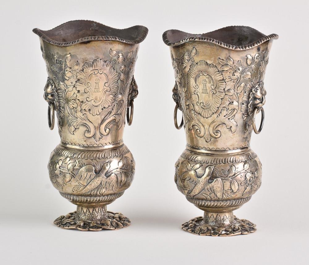 Pair of English sterling silver Vases: Pairpoint Bros.: London, Circa 1902, Hallmarked initials JP over FP in square. hand chased intricate floral and lion designs, 26 OZT total